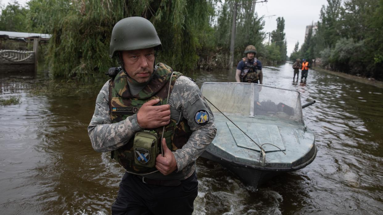 KHERSON, UKRAINE - Jun. 12, 2023: Volunteers actively helping to rescue local residents