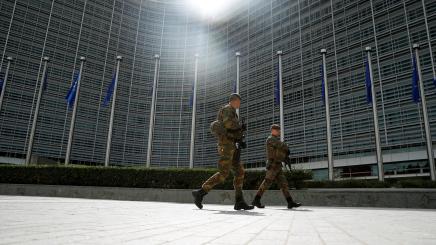 Soldiers patrol outside the European Commission