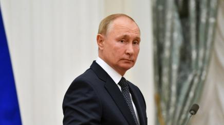 Russian President Vladimir Putin looks on during a meeting with athletes, participants of the 2020 Tokyo Olympic Games, in Moscow, Russia September 11, 2021.
