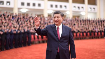 Chinese President Xi Jinping, also general secretary of the Communist Party of China (CPC) Central Committee and chairman of the Central Military Commission, waves while meeting with awardees of the titles of outstanding Party members, exemplary Party workers, and advanced community-level Party organizations from across the country before the ceremony to present the July 1 Medal, the Party s highest honor, to outstanding Party members at the Great Hall of the People in Beijing, capital of China, June 29, 20